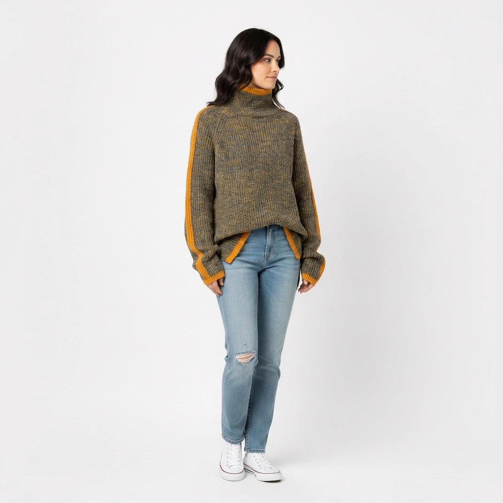 Woman wearing a turtleneck sweater with light blue jeans on a white background