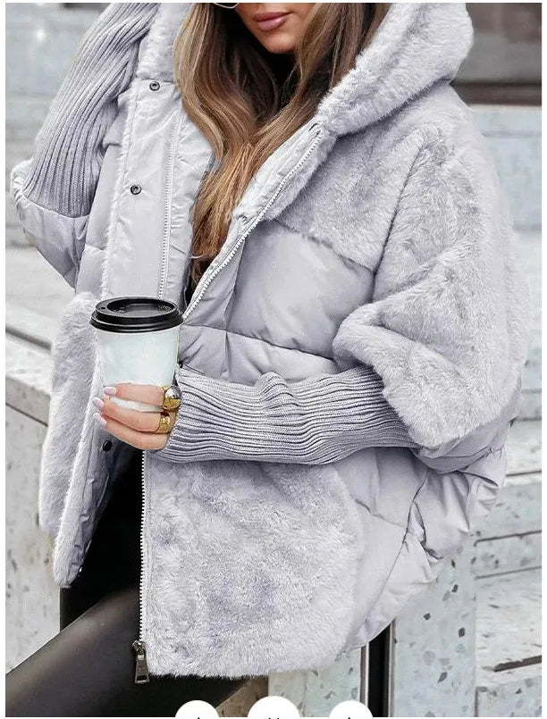 Aurelia women's quilted hooded winter coat in grey, model wearing plush quilted design with warm hood for winter weather