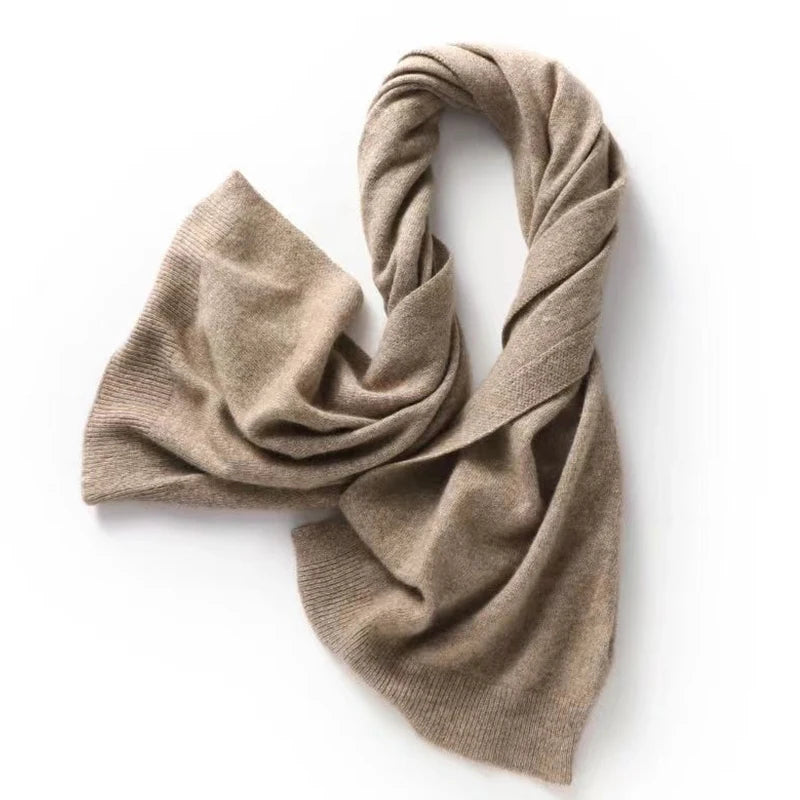 Light brown wool wrap shawl draped over a white background