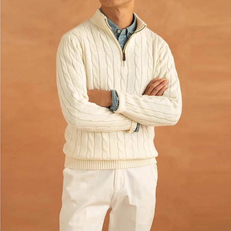 Hugh jacquard mock neck half-zip sweater for men in beige, model with arms crossed showcasing the refined jacquard knit