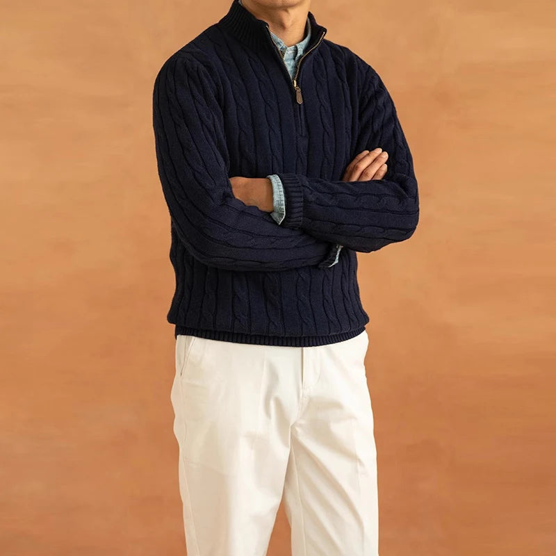 Hugh jacquard mock neck half-zip sweater for men in navy blue, model with arms crossed wearing the elegant mock-neck sweater